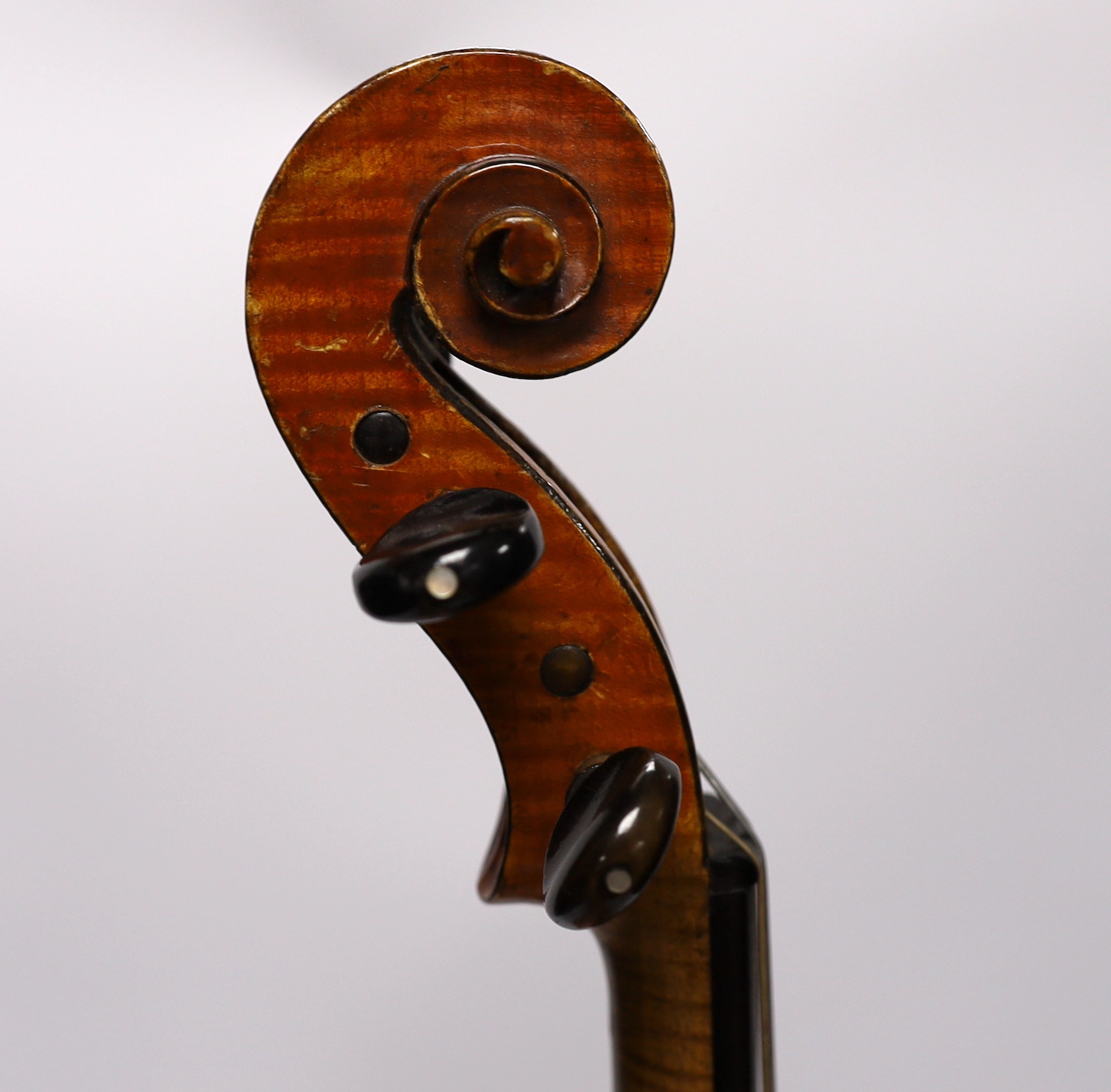 A cased late 19th/early 20th century French violin, bears Joseph Guarnerius label